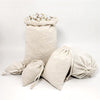" 50Pcs Elegant Cotton Muslin Bags - Perfect for Gifts, Jewelry, and Home Storage!"