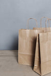 "250 Brown Paper Carrier Bags - Strong Twisted Handles - Perfect for Medium-Sized Items - 10"X4.5"X12""