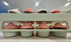 "Stylish and Sturdy Green Cupcake Carrier - Holds 24 Cupcakes, Perfect for Travel and Storage!"
